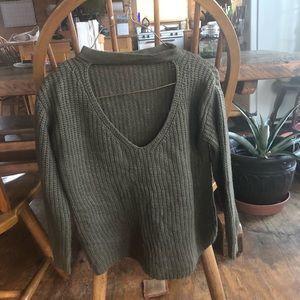 Knitted green cutout sweater
